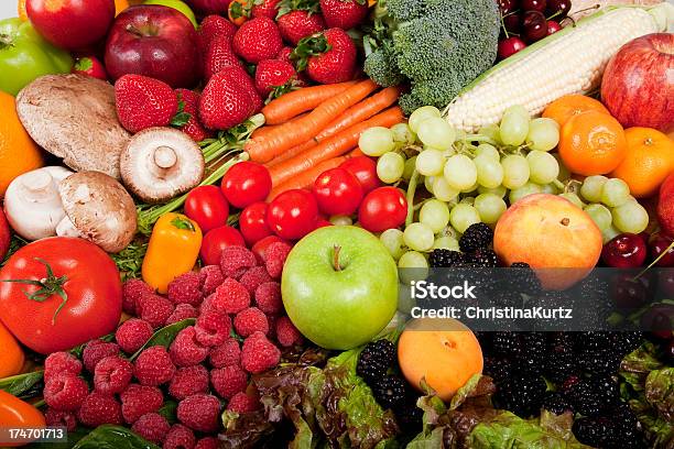 Fresh Organic Strawberry Grape Apple Tomato Orange Garden Produce Background Stock Photo - Download Image Now