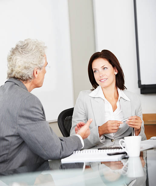 istock Business executives discussing in a meeting 174702067