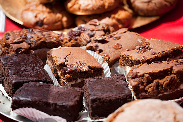 Fresh baked cookies, brownies at charity fundraiser bake sale stock photo