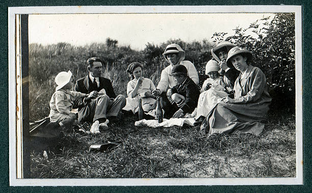 Edwardian Family Picnic Vintage Photograph Vintage photograph of an Edwardian family having a picnic. edwardian style photos stock pictures, royalty-free photos & images