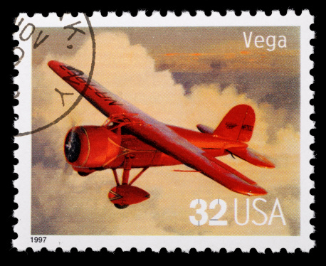 very old German biplane, vintage postage stamp.