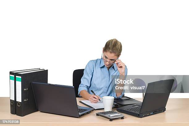 Female Office Worker Stock Photo - Download Image Now - 20-24 Years, Adult, Analyzing