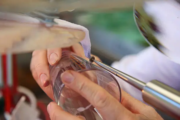 Close-up of an engraver at work.