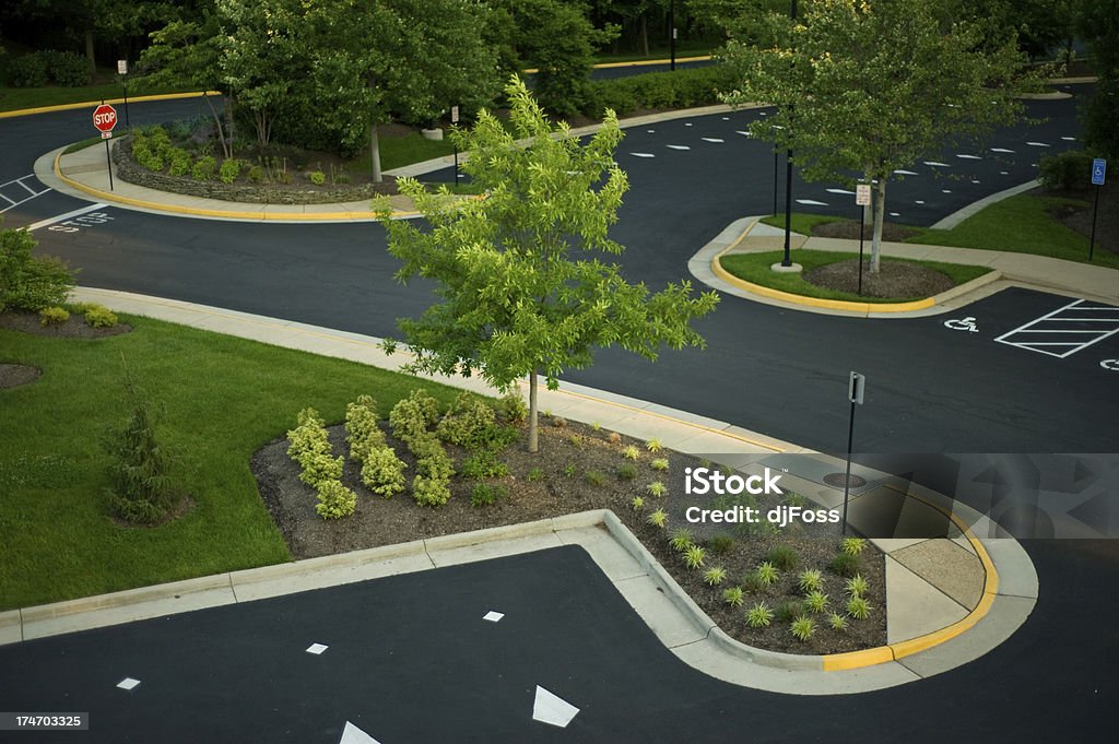Office Parking Lot Modern landscaped parking lot area in office park. Office Stock Photo