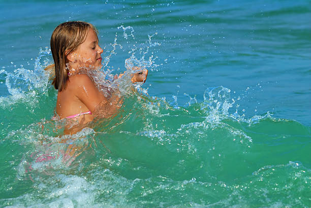 Girl playing in water