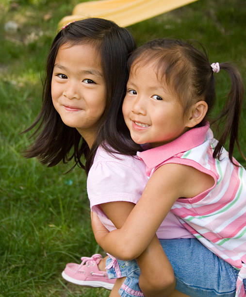 istock Closeup of sisters playing together 174703666