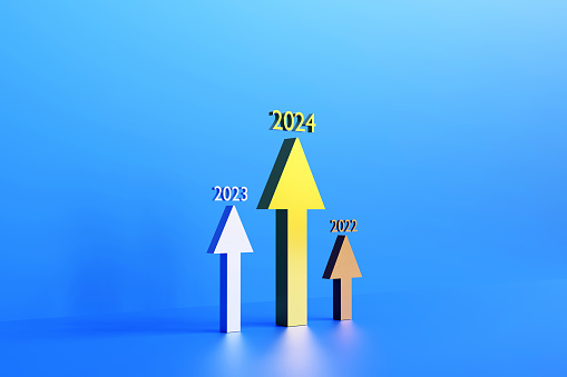 2024 growth chart. Arrows moving up growth chart business finance concept. Group of colorful arrows on colored background with calendar date