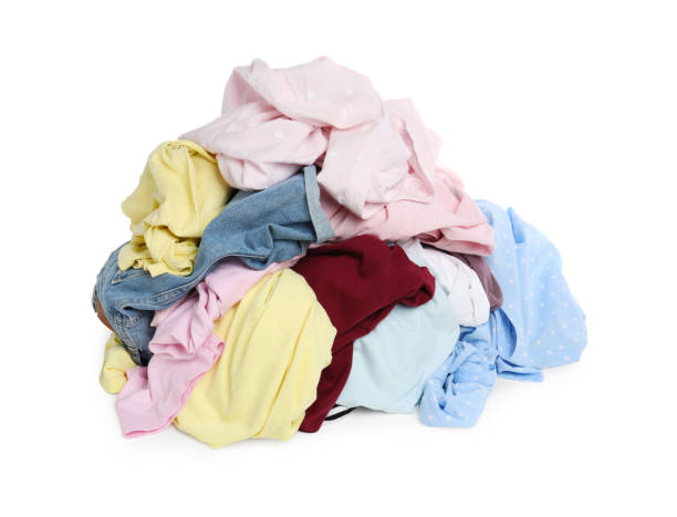 istock Pile of colorful clothes isolated on white 1747050468
