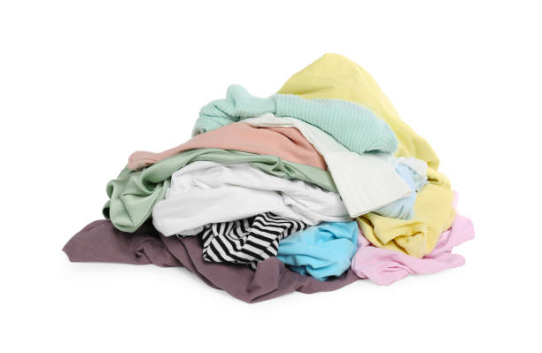 istock Pile of colorful clothes isolated on white 1747051041