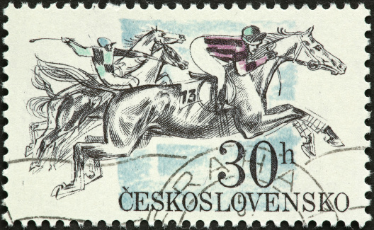 old Czechoslovakian stamp with illustrated horse race.