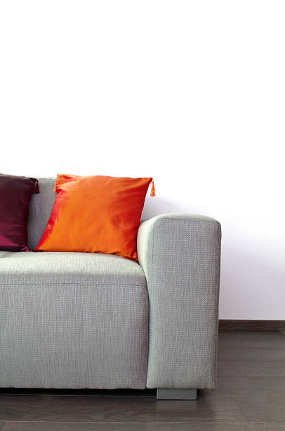 istock Part of modern sofa against white wall 174706591
