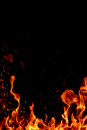 Pure flame and bright fire sparks isolated on black background