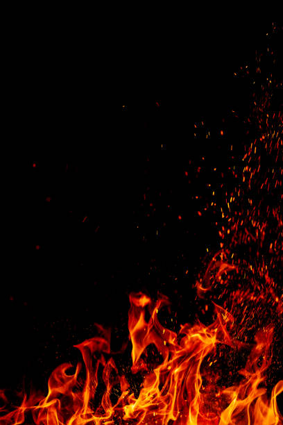 istock Pure flame and bright fire sparks isolated on black background 1747071696