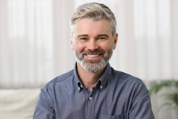 istock Happy man having video call at home, view from web camera 1747098650