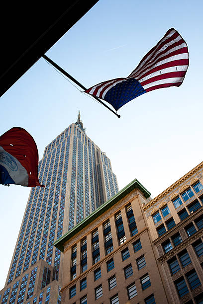 istock Empire State Building and American Flag 174710854