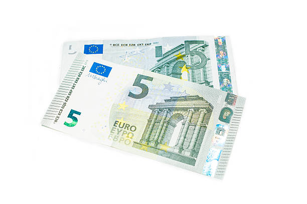 New five Euro banknote The new 2013 five Euro banknote 2013, on top of the old 2002 banknote five euro banknote photos stock pictures, royalty-free photos & images