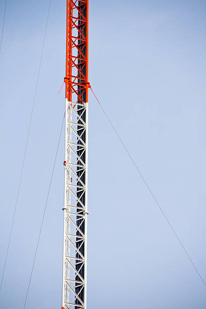 Telecommunications tower. Mobile phone base station Telecommunications tower. Mobile phone base station fiels stock pictures, royalty-free photos & images