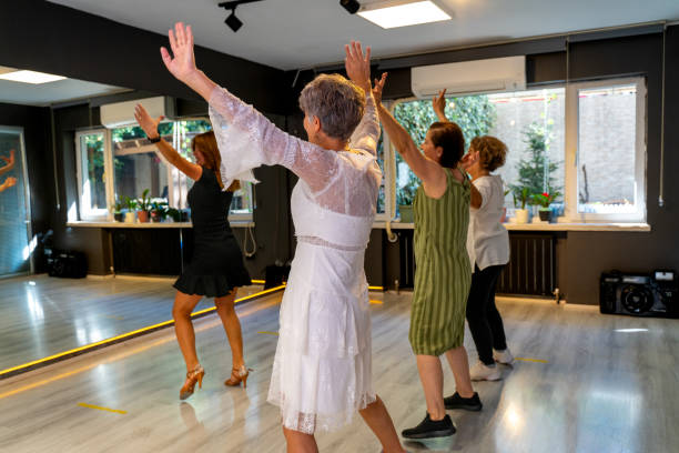 istock Senior woman enjoys dance class 1747189404