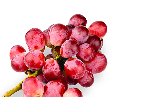 Ripe red grape on a white background.