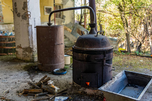 istock Crafting Spirits: Traditional Distillation in Rural Serenity 1747259141