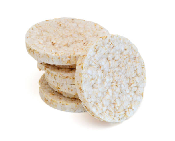 istock Pile of stack puffed rice cakes isolated on white. 1747312468