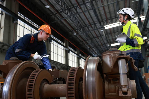 istock Blue-collar worker at the electric train  maintenance station 1747344608