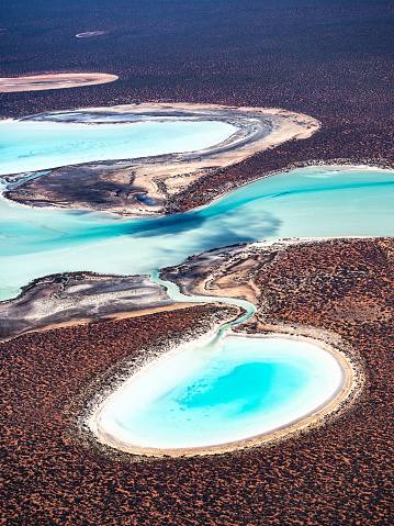 Aerial view of turquoise lagoon at Shark Bay Western Australia taken from a small plane