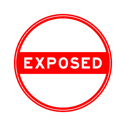 Red color round seal sticker in word exposed on white background