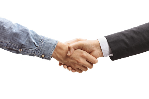 Salesman shaking hands with a customer isolated on white background