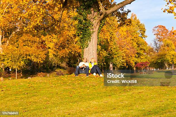 Couple Enjoying The Autumn Stock Photo - Download Image Now - Adult, Adults Only, Autumn