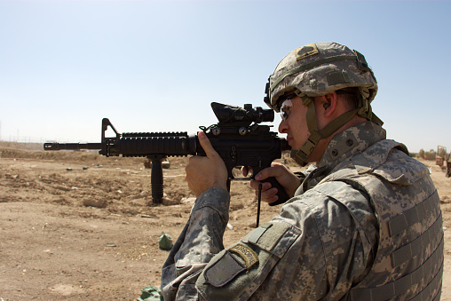 Soldier firing M-4 Carbine in Ramadi, Iraq. 