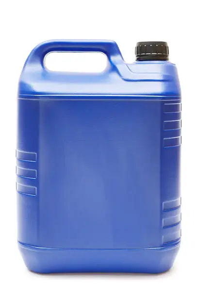 Blue plastic oil canister isolated on a white background.