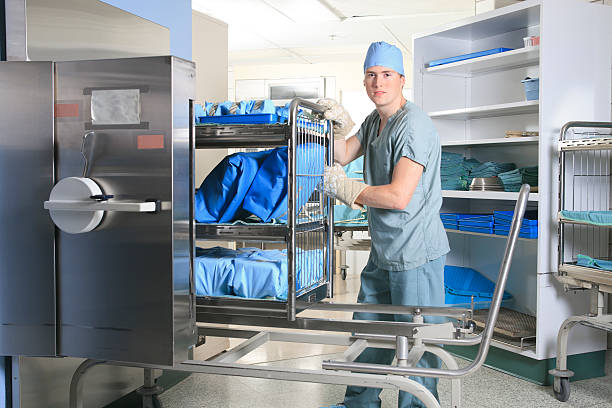 Sterilizer in Hospital - Employee Sterilizer in Hospital - Employee chariot photos stock pictures, royalty-free photos & images