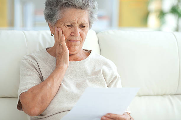 istock Senior woman with some document at home. 174748351