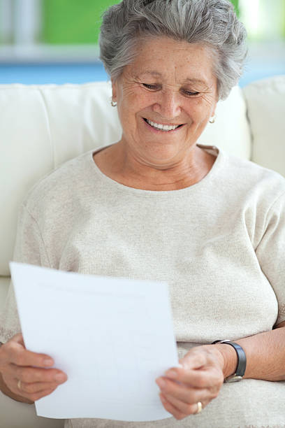 istock Senior woman with some document at home. 174748688