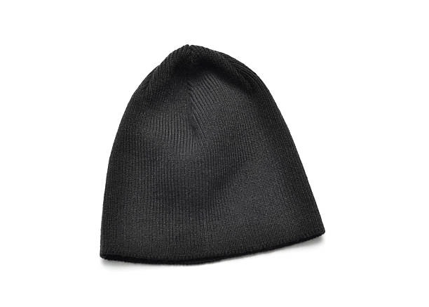 Black Toque Close up of a black toque on a white background with shadows.  Winter images toque stock pictures, royalty-free photos & images