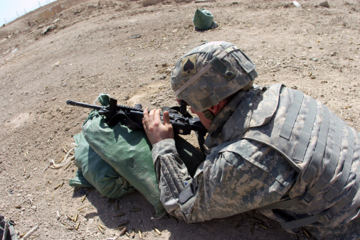 Soldier firing M-4 Carbine in Ramadi, Iraq. 