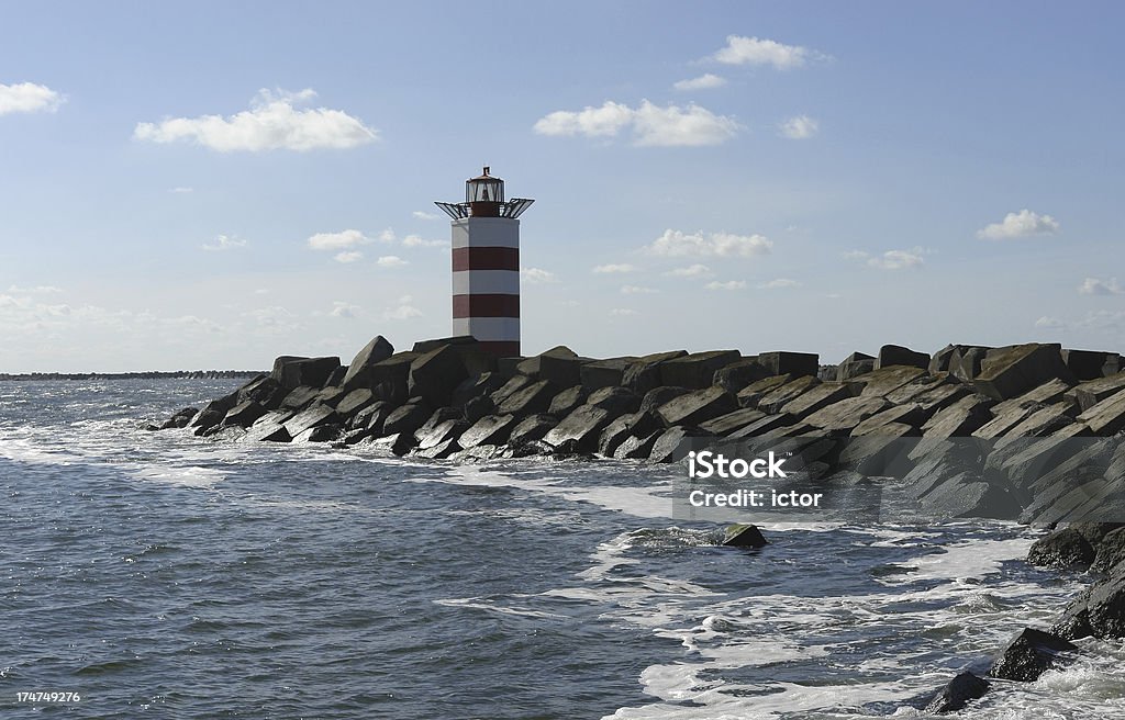 Lighthouse Lighthouse at the end of the pier Ijmuiden Stock Photo