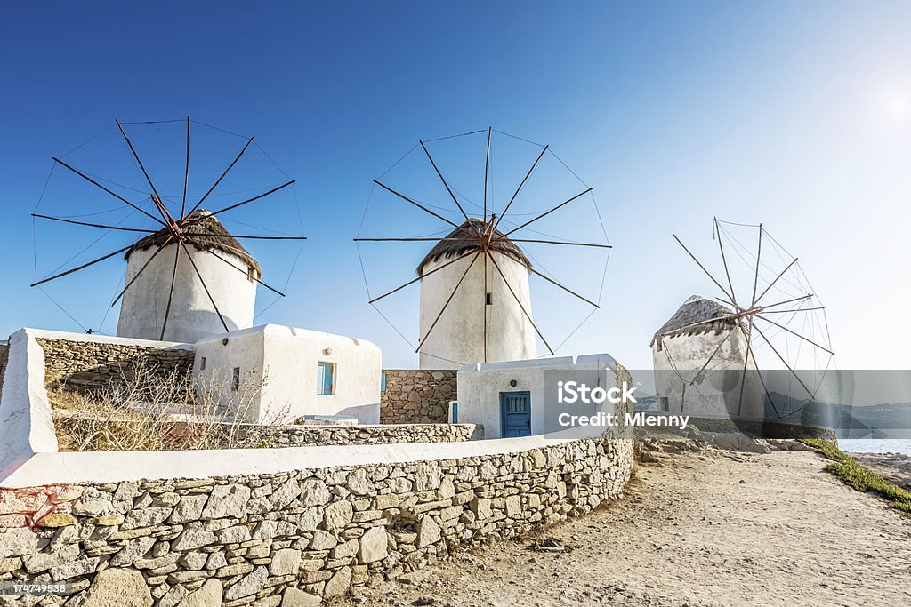 Mykonos Windmills, Greece "Famous traditional old windmills on top of the hills on Mykonos Island, Cyclades, Greece." Mykonos Stock Photo