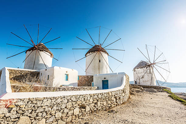 Mykonos Windmills, Greece "Famous traditional old windmills on top of the hills on Mykonos Island, Cyclades, Greece." mykonos photos stock pictures, royalty-free photos & images