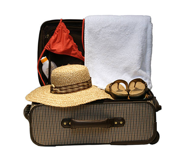 Suitcase ready for vacation or travel stock photo