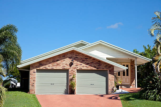 Small Suburban Home with blue sky stock photo