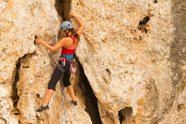 istock Woman rockclimbing 174751219