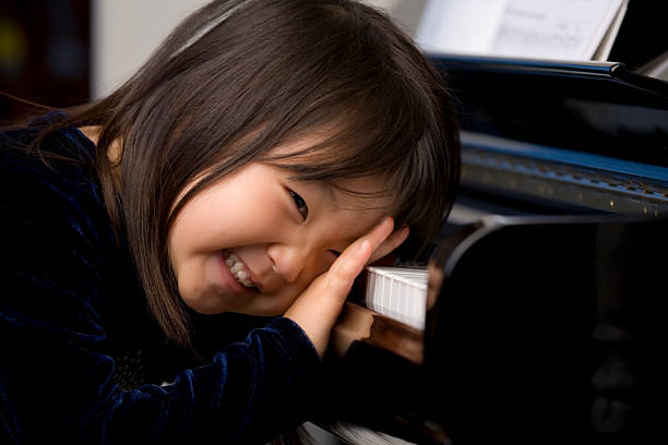 istock Piano girl 174751309