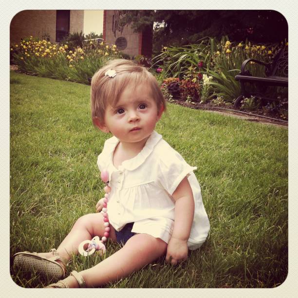 istock 9 Month Old Baby Girl 174751333