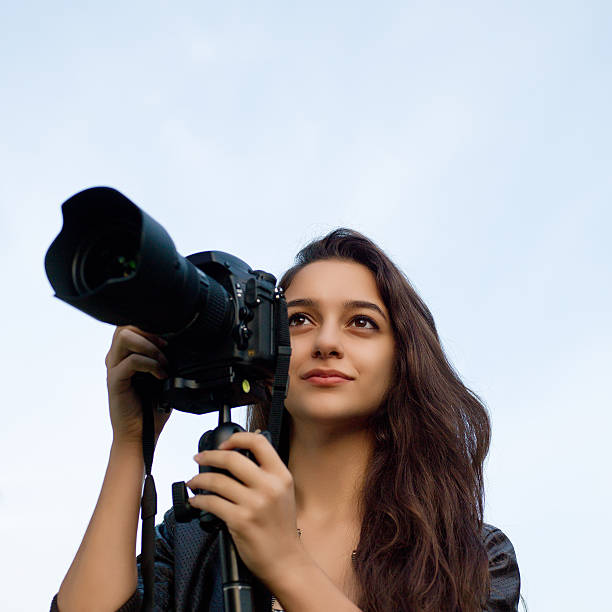 istock Young beautiful girl taking pictures 174751454