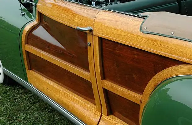 Light and dark wood door panels on a classic street rod.  From 2006 Frog Follies.