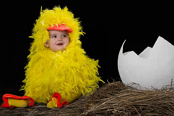 Baby in little chicken costume