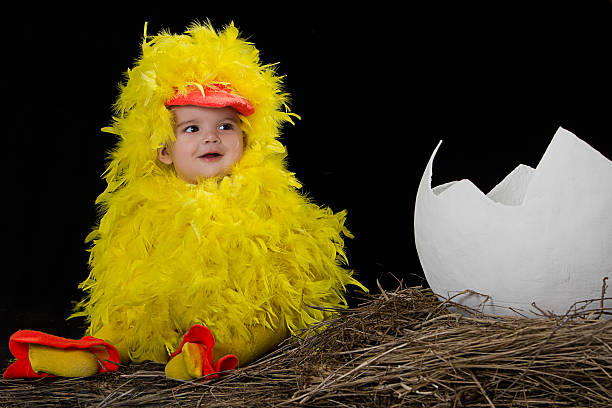 baby in little chicken costume - tavuk kostümü stok fotoğraflar ve resimler