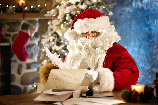 istock Santa looking at the list 174752861